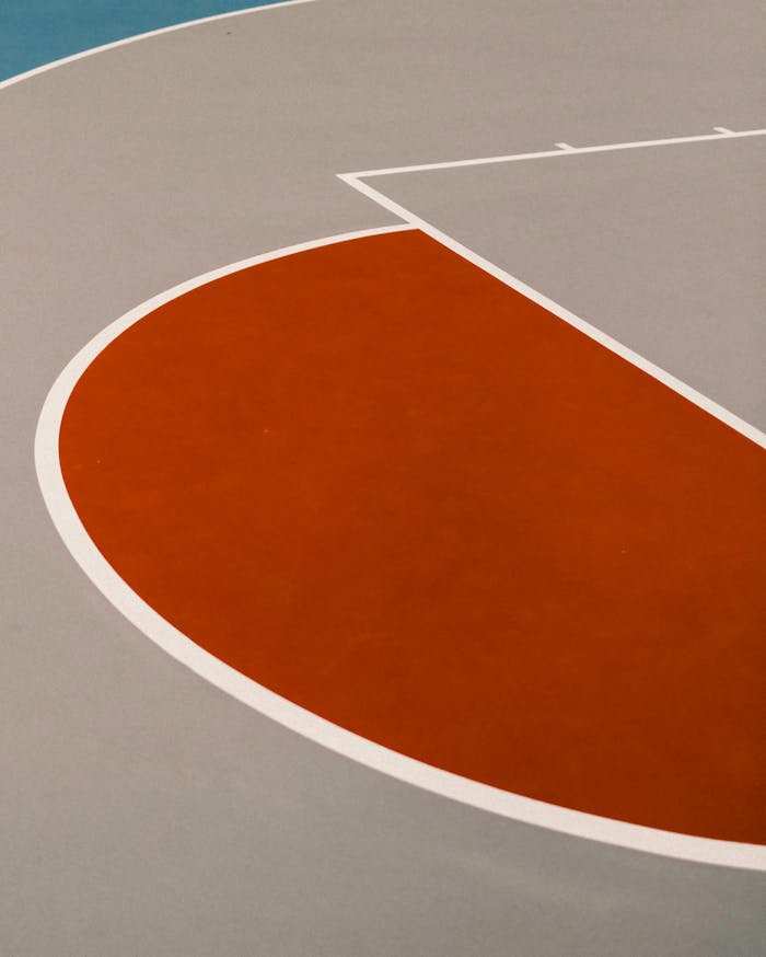 Close-up view of vibrant lines and shapes on a sports court in Brisbane, Australia.